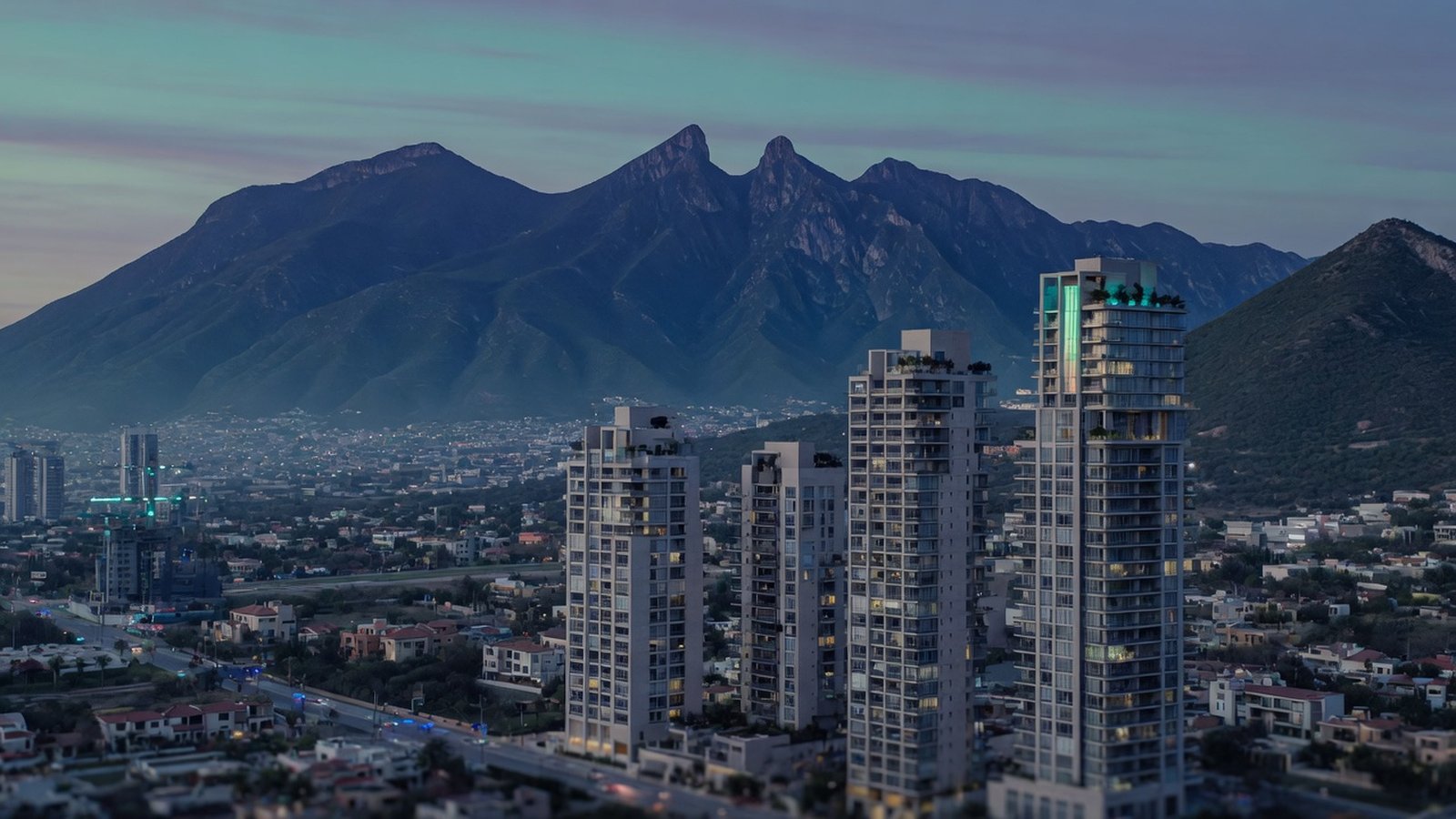 Interior de un departamento con vista a las montañas de Monterrey